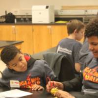 Students testing energy output from lemons